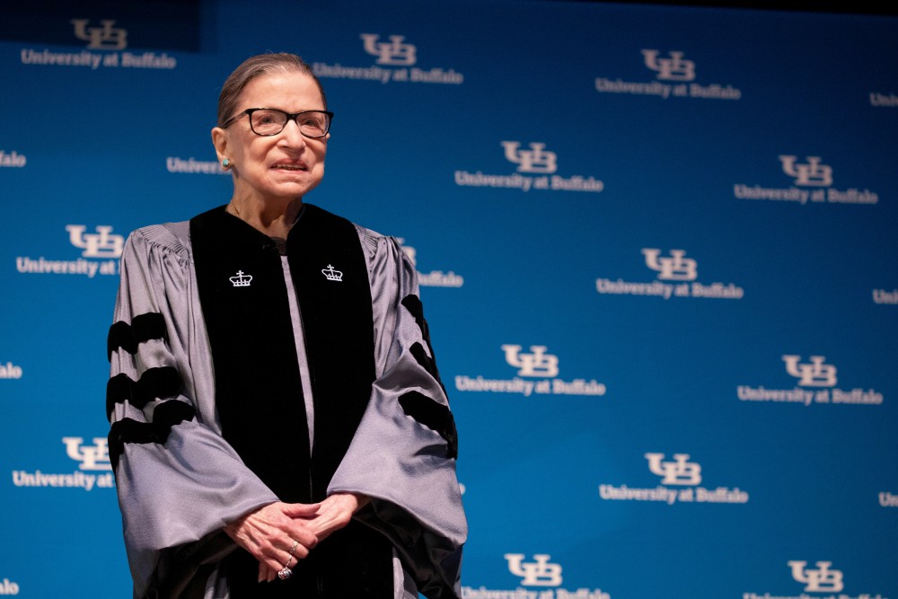 FILE PHOTO: U.S. Supreme Court Justice Ruth Bader Ginsburg smiles during a reception where she was presented with an honorary doctoral degree at the University of Buffalo School of Law in Buffalo, New York, U.S., August 26, 2019. REUTERS/Lindsay DeDario