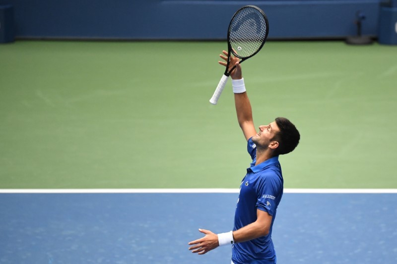 Novak Djokovic of Serbia celebrates after his match against Kyle Edmund of the United Kingdom (not pictured) on day three of the 2020 U.S. Open tennis tournament at USTA Billie Jean King National Tennis. Danielle Parhizkaran-USA TODAY Sports/Reuters