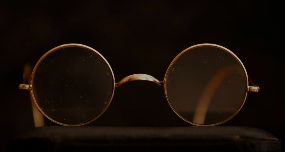 A pair of round Windsor spectacles that belonged to John Lennon is seen at Sotheby's auction house ahead of their "Beatles for Sale" auction in London, Britain September 25, 2020. REUTERS/John Sibley