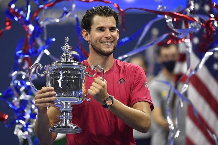 Dominic Thiem of Austria celebrates with the championship trophy after his match against Alexander Zverev of Germany (not pictured) in the men's singles final match on day fourteen of the 2020 U.S. Open tennis tournament at USTA Billie Jean King National Tennis Center. Credit: Danielle Parhizkaran-USA TODAY Sports