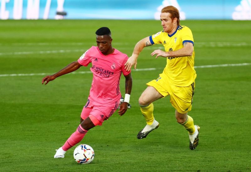 Real Madrid's Vinicius Junior in action with Cadiz's Alex Fernandez REUTERS/Sergio Perez