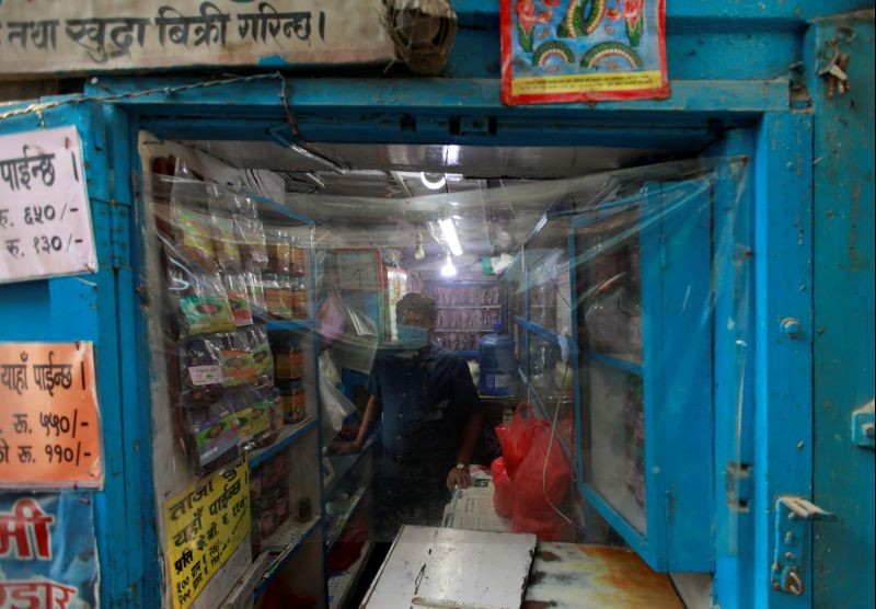 A plastic sheet is kept as a barrier at a shop amid the spread of coronavirus disease (COVID-19) in Kathmandu, Nepal on October 9, 2020. (REUTERS Photo)