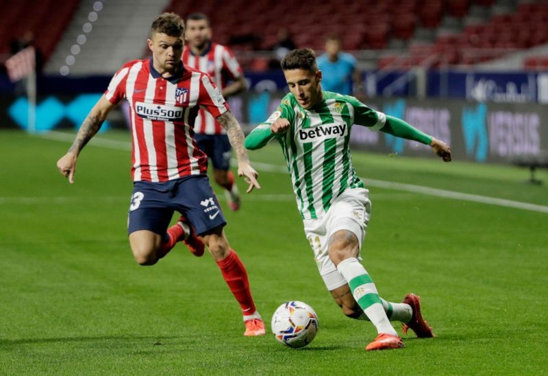 Atletico Madrid's Kieran Trippier in action with Real Betis' Cristian Tello REUTERS/Javier Barbancho