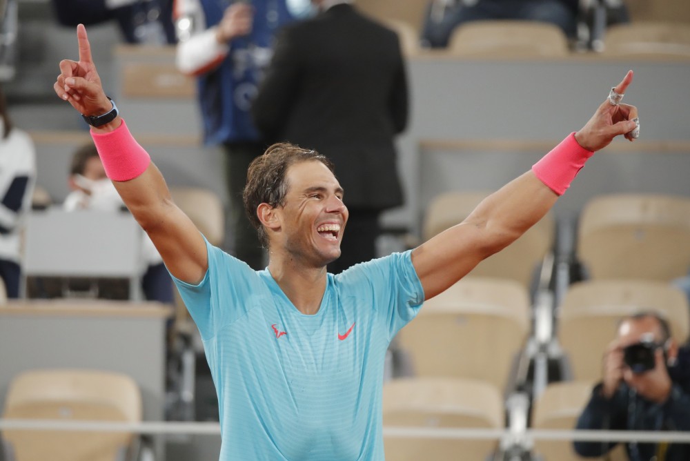Tennis - French Open - Roland Garros, Paris, France - October 11, 2020 Spain’s Rafael Nadal celebrates after winning the French Open final against Serbia’s Novak Djokovic REUTERS/Charles Platiau