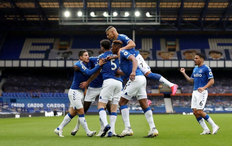 Soccer Football - Premier League - Everton v Liverpool - Goodison Park, Liverpool, Britain - October 17, 2020  Everton's Michael Keane celebrates scoring their first goal with team mates Pool via REUTERS/Catherine Ivill