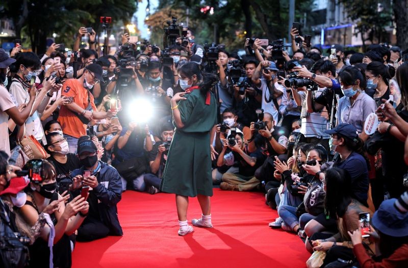 A protester performs on a red carpet while taking part in a protest against the government and to reform monarchy in Bangkok, Thailand, October 29, 2020. (REUTERS Photo)