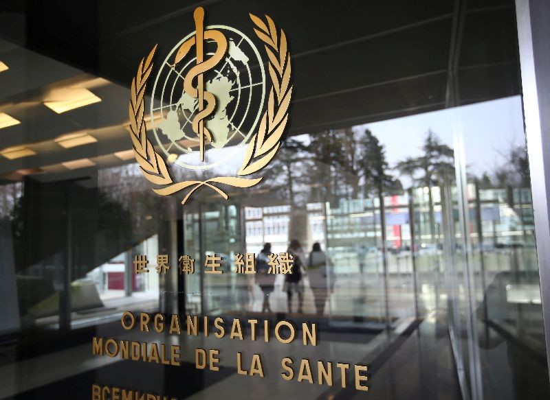 A logo is pictured outside a building of the World Health Organization (WHO) during an executive board meeting on update on the coronavirus outbreak, in Geneva, Switzerland, February 6, 2020. REUTERS/Denis Balibouse/File Photo