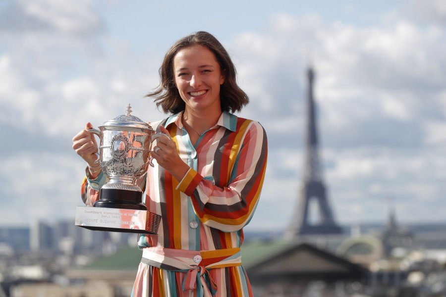 Tennis - French Open - Galeries Lafayette Rooftop, Paris, France - October 11, 2020 Poland's Iga Swiatek poses with the trophy after winning the French Open yesterday REUTERS/Charles Platiau/Files