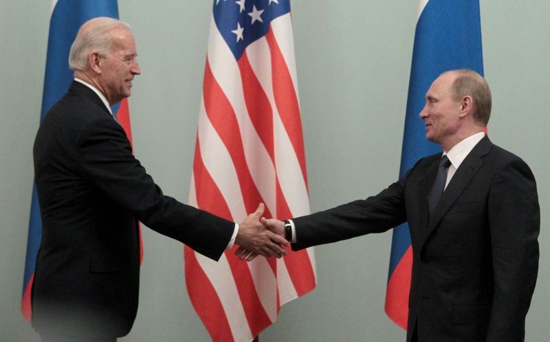 Russian Prime Minister Vladimir Putin shakes hands with U.S. Vice President Joe Biden during their meeting in Moscow March 10, 2011. (REUTERS File Photo)