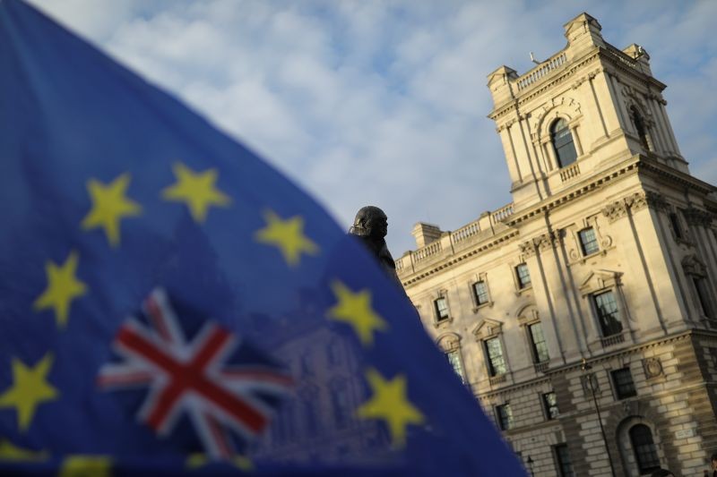 A flag is seen outside the Houses of Parliament near the statue of former Prime Minister Winston Churchill in London, Britain January 29, 2020. (REUTERS File Photo)