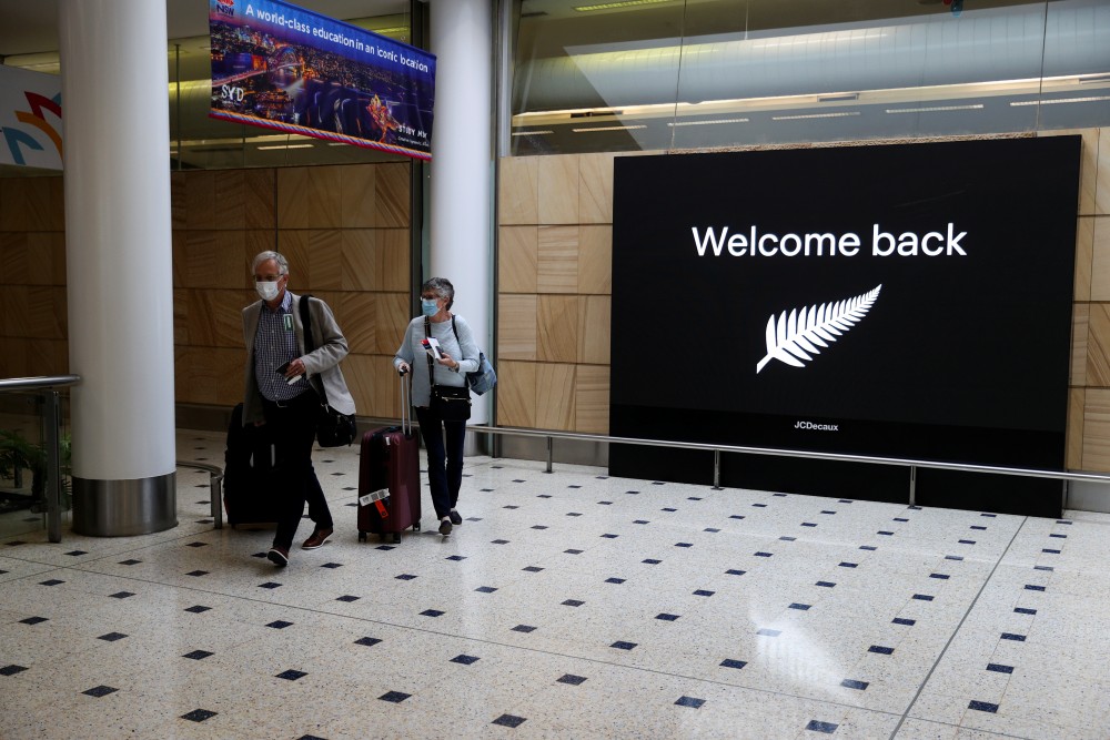 Passengers arrive from New Zealand after the Trans-Tasman travel bubble opened overnight, following an extended border closure due to the coronavirus disease (COVID-19) outbreak, at Sydney Airport in Sydney, Australia, October 16, 2020. REUTERS/Loren Elliott