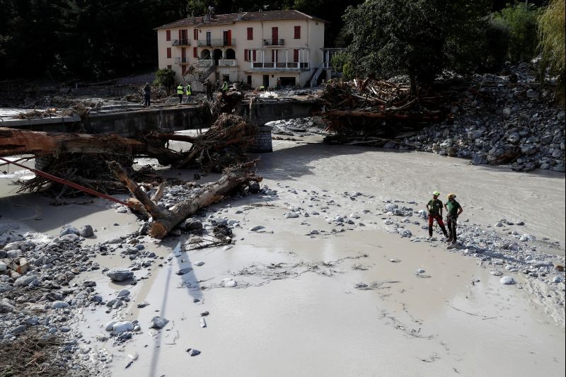 Emergency workers remove trees from the Roya river in Breil-sur-Roya as clean-up operations continue after storm Alex hit southern France, bringing record rainfall in places and causing heavy flooding that swept away roads and damaged homes, France on October 5, 2020.  (REUTERS Photo)