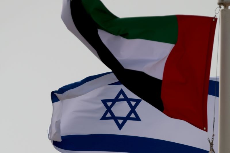 Emirati and Israeli flags fly upon the arrival of Israeli and U.S. delegates at Abu Dhabi International Airport, in Abu Dhabi, United Arab Emirates August 31, 2020. (REUTERS File photo)