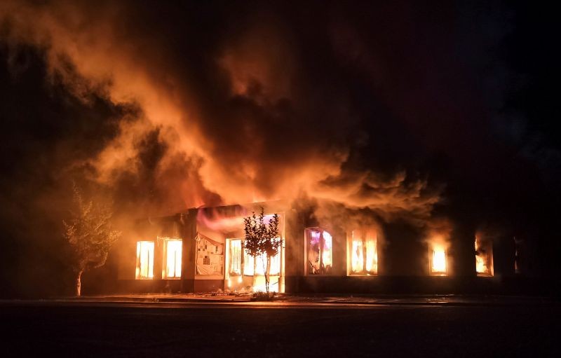 A shop is seen on fire following recent shelling during a military conflict over the breakaway region of Nagorno-Karabakh in Stepanakert October 3, 2020. (REUTERS Photo)