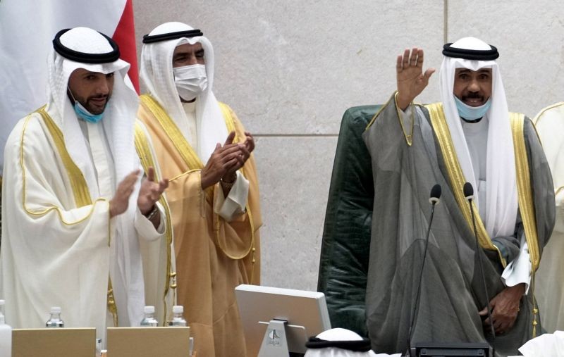 Kuwait's new Emir Nawaf al-Ahmad al-Sabah gestures as speaker of parliament Marzouq al-Ghanim claps during a parliament session, in Kuwait City, Kuwait October 20, 2020. (REUTERS Photo)