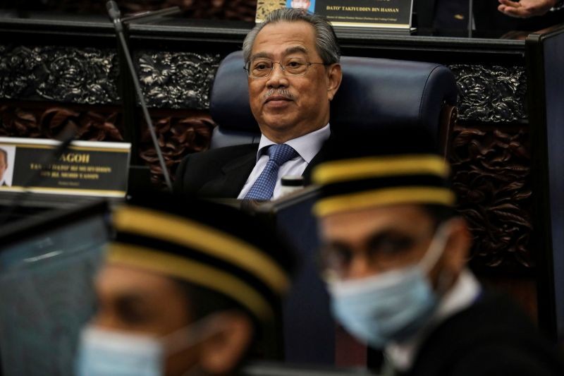 Malaysia's Prime Minister Muhyiddin Yassin reacts during a session of the lower house of parliament, in Kuala Lumpur, Malaysia on July 13, 2020. (REUTERS File Photo)