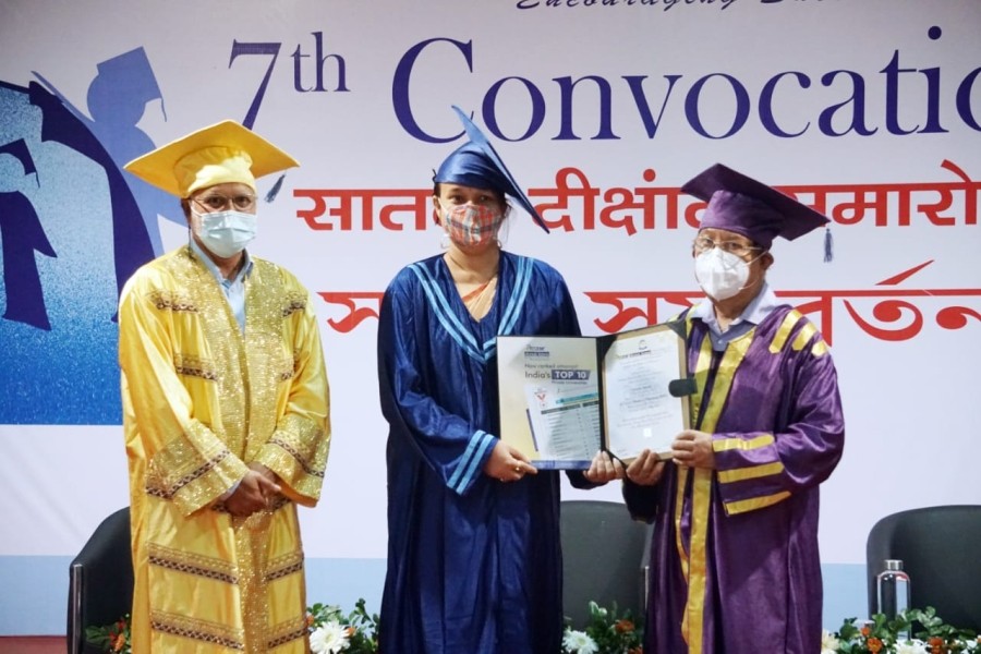 A student receives her degree during the 7th Convocation Day of the Assam down town University held on October 19. (Photo: AdtU)