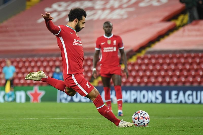 Liverpool's Mohamed Salah scores their second goal from the penalty spot Pool via REUTERS/Michael Regan