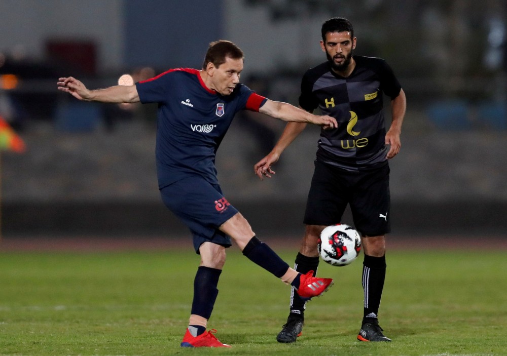 Ezzeldin Bahader, a 74-years-old Egyptian football player of 6th October Club is seen in action during a soccer match against El Ayat Sports Club of Egypt's third division league at the Olympic Stadium in the Cairo suburb of Maadi, Egypt October 17, 2020. REUTERS/Amr Abdallah Dalsh