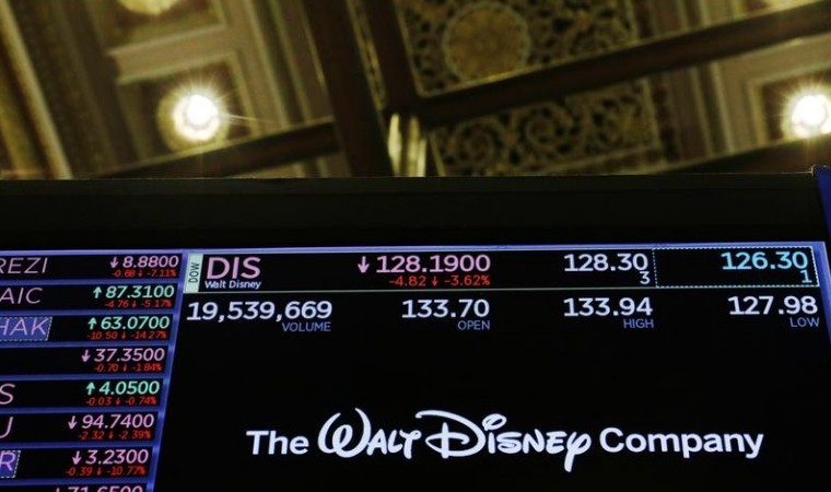 FILE PHOTO: The logo of the Walt Disney Company is displayed above the floor of the New York Stock Exchange shortly after the closing bell as the market takes a significant dip in New York, U.S., February 25, 2020. REUTERS/Lucas Jackson