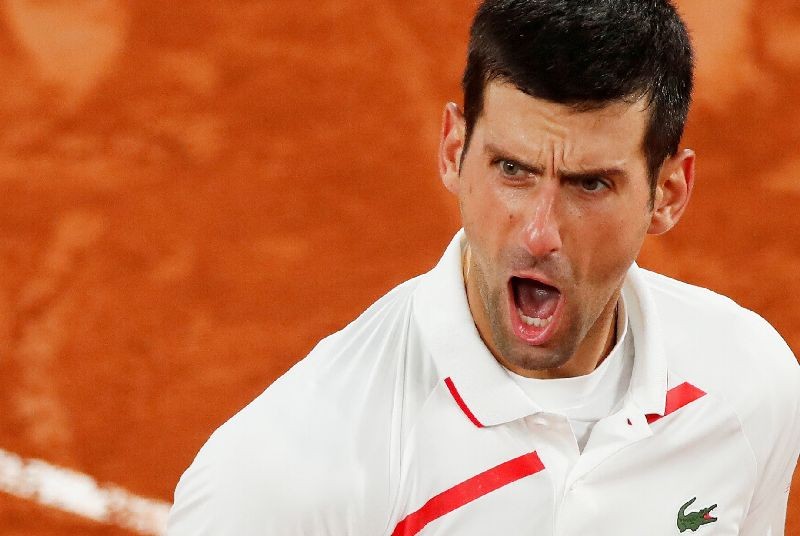 Tennis - French Open - Roland Garros, Paris, France - October 7, 2020 Serbia's Novak Djokovic reacts during his quarter final match against Spain's Pablo Carreno Busta REUTERS/Gonzalo Fuentes