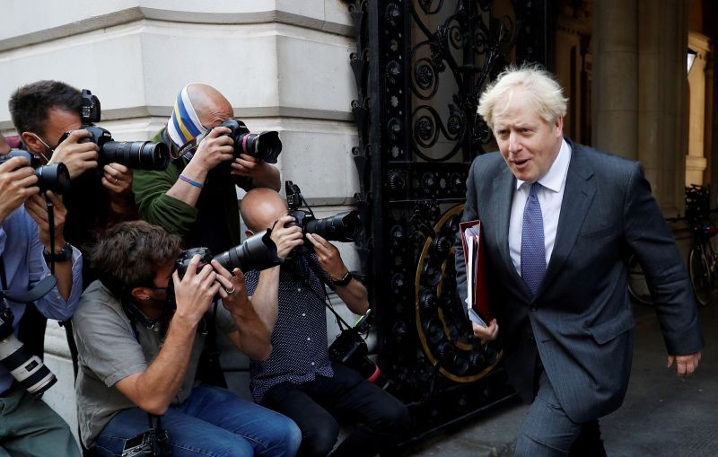 Britain's Prime Minister Boris Johnson returns to 10 Downing Street after a cabinet meeting in London, Britain on September 15, 2020. (REUTERS File Photo)