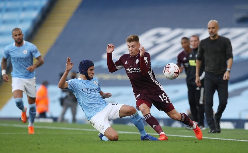 Manchester City's Eric Garcia in action with Leicester City's Harvey Barnes Pool via REUTERS/Martin Rickett/Files