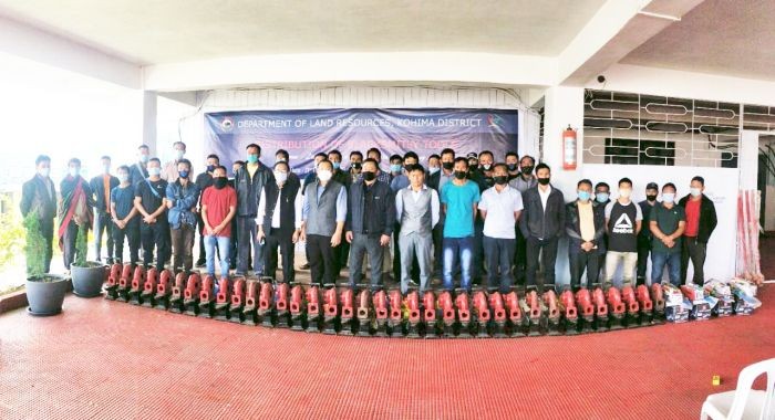 Officials and beneficiaries during the distribution of blacksmith tools to 38 project villages of batch V and VI of Kohima district under PMKSY-WDC.