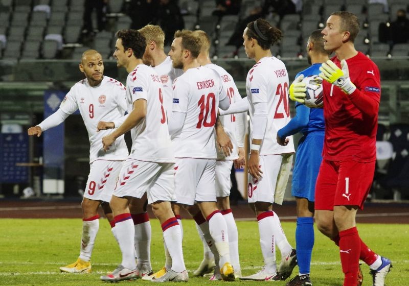 Denmark's Martin Braithwaite and teammates celebrate after Iceland's Runar Mar Sigurjonsson scored an own goal and Denmark's first REUTERS/Rosa Bragadottir