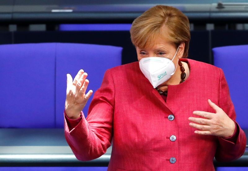 German Chancellor Angela Merkel wears a face mask as she attends a session of the German lower house of parliament Bundestag, as the spread of the coronavirus disease (COVID-19) continues in Berlin, Germany, October 29, 2020. (REUTERS Photo)