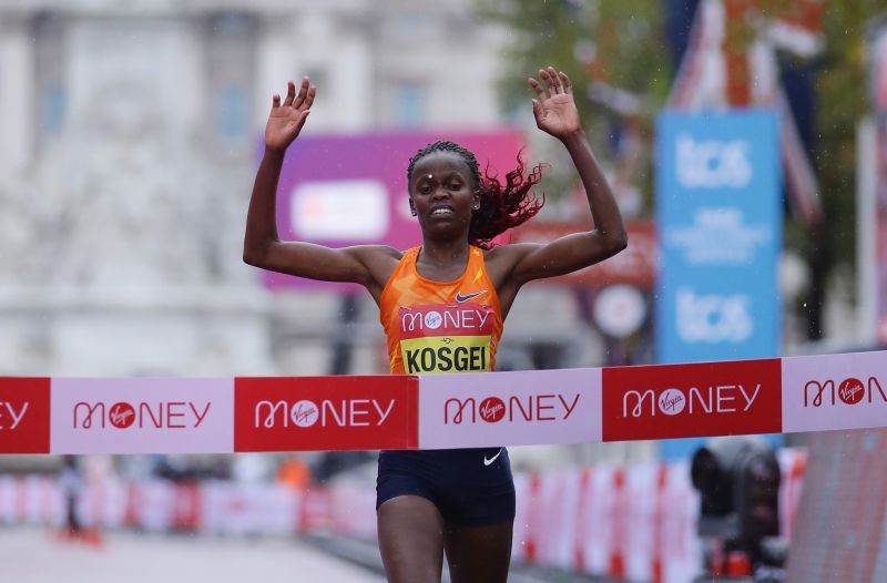 Athletics - London Marathon - London, Britain - October 4, 2020 Kenya's Brigid Kosgei celebrates as she wins the elite women's race of the London Marathon Pool via REUTERS/Richard Heathcote