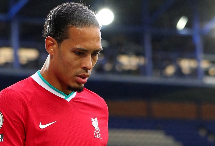 Soccer Football - Premier League - Everton v Liverpool - Goodison Park, Liverpool, Britain - October 17, 2020 Liverpool's Virgil van Dijk walks off after sustaining an injury before being substituted Pool via REUTERS/Peter Byrne/Files