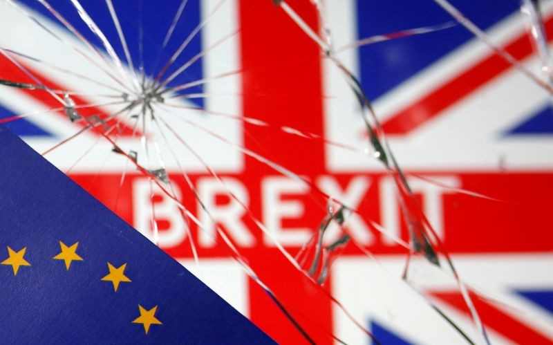 EU flag are placed on broken glass and British flag in this illustration picture taken on January 31, 2020. (REUTERS File Photo)