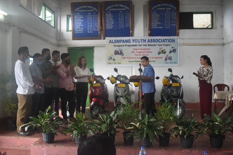 Minister for PWD, Mechanical and Housing, Tongpang Ozukum flagging off a two wheeler taxi project at Alempang Community hall, Mokokchung on October 1.