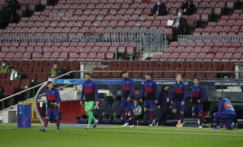 FC Barcelona's Lionel Messi and teammates walk out on the pitch before the match REUTERS/Albert Gea/File photo
