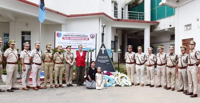 CP Dimapur Rothihu Tetseo IPS and Police officers with the wife and daughter of Unit Martyr Lt. Thiubuibo Zeliang at CP Dimapur office on October 21. (DIPR Photo)