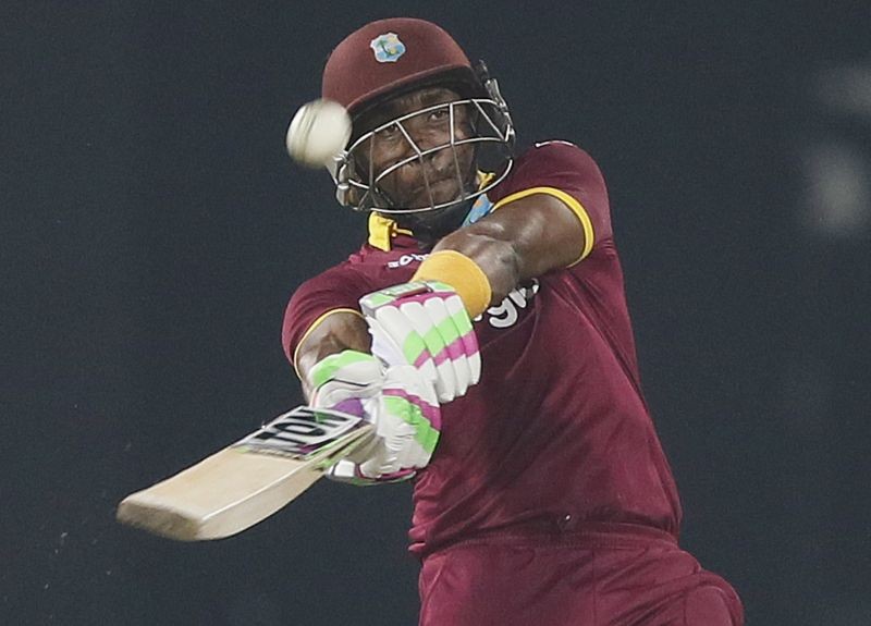 West Indies' Dwayne Bravo hits a six during their second Twenty 20 International cricket match against Sri Lanka in Colombo November 11, 2015. REUTERS/Dinuka Liyanawatte/File photo