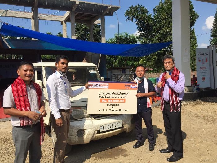 Indian Oil Company officials felicitate Hongnaw Konyak with Rs 25,000 Fuel Voucher Card during the ‘check and fill awareness campaign’ held at Tizit village petrol pump on October 17.