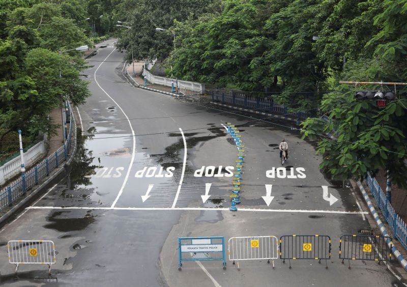 A man rides his bicyle on a deserted road, during the two-day weekly lockdown in the West Bengal state, amidst the spread of the coronavirus disease (COVID-19), in Kolkata, August 5, 2020. (REUTERS  File Photo)