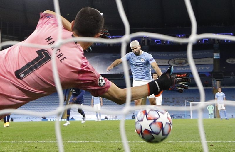 Manchester City's Sergio Aguero scores their first goal from the penalty spot Pool via REUTERS/Phil Noble