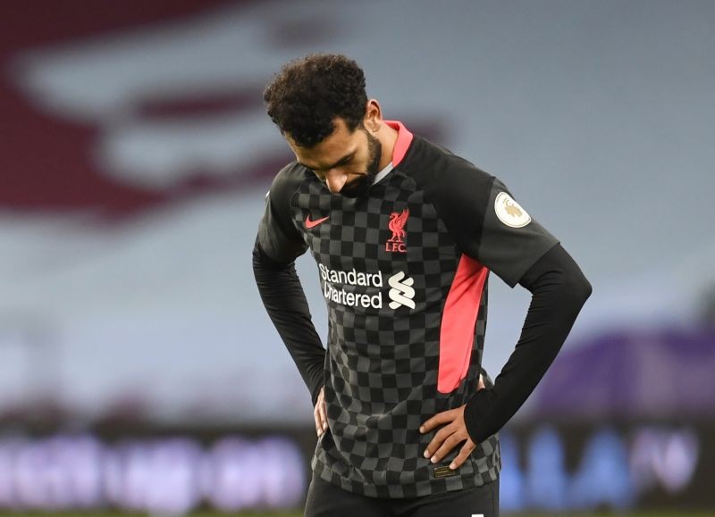 Liverpool's Mohamed Salah looks dejected after conceding their sixth goal. Pool via REUTERS/Peter Powell