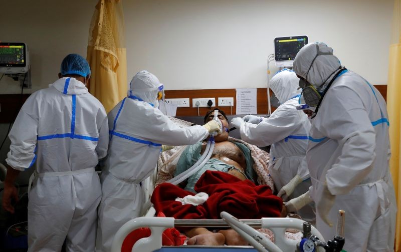 Medical workers take care of a patient suffering from the coronavirus disease (COVID-19), at the Intensive Care Unit (ICU) of the Yatharth Hospital in Noida, on the outskirts of New Delhi on September 15, 2020. (REUTERS File Photo)