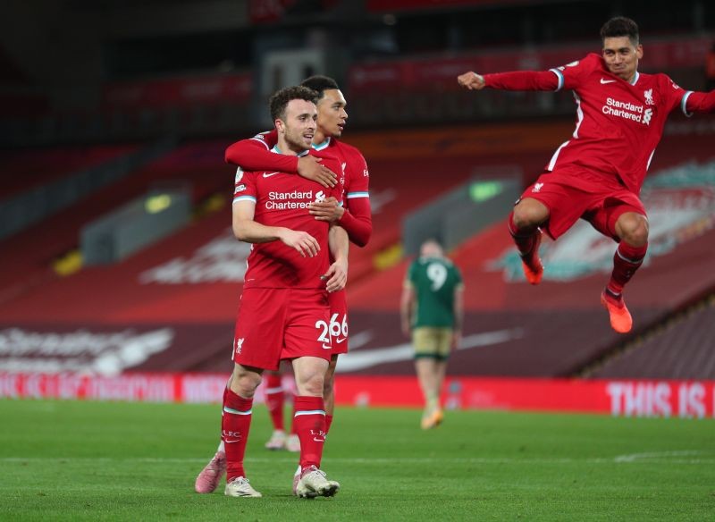 Liverpool's Diogo Jota celebrates scoring their second goal with Roberto Firmino and Trent Alexander-Arnold Pool via REUTERS/Peter Byrne