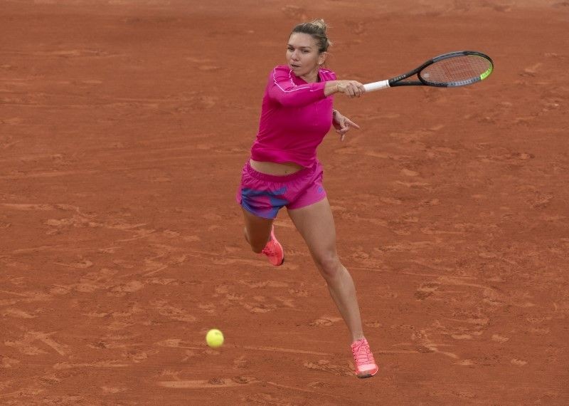 Sep 30, 2020; Paris, France; Simona Halep (ROU) in action during her match against Irina-Camelia Begu (ROU) on day four at Stade Roland Garros. Mandatory Credit: Susan Mullane-USA TODAY Sports