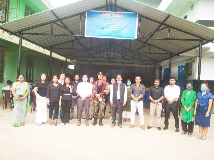 Commandant, 5 AR, Col Raza Israil, along with management and teachers of Herbert Spencer School, at the inauguration program of waiting shed on October 31. (Morung Photo)