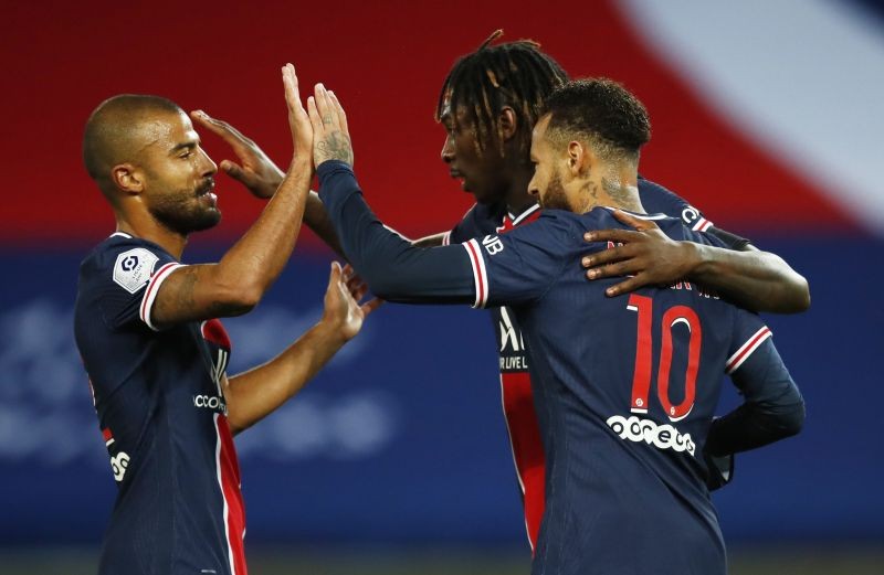 Paris St Germain's Moise Kean celebrates scoring their second goal with teammates REUTERS/Gonzalo Fuentes