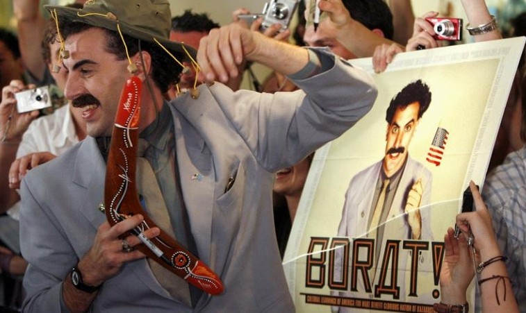 FILE PHOTO: British actor Sacha Baron Cohen, in character as a Kazakh TV reporter known as 'Borat', holds a boomerang as he mingles with fans in Sydney November 13, 2006 during the Australian premiere of his film "Borat: Cultural Learnings of America for Make Benefit Glorious Nation of Kazakhstan". REUTERS/David Gray