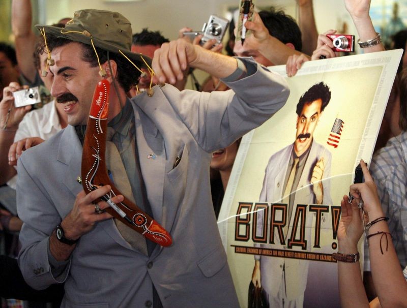 FILE PHOTO: British actor Sacha Baron Cohen, in character as a Kazakh TV reporter known as 'Borat', holds a boomerang as he mingles with fans in Sydney November 13, 2006 during the Australian premiere of his film "Borat: Cultural Learnings of America for Make Benefit Glorious Nation of Kazakhstan" (Reuters File Photo)
