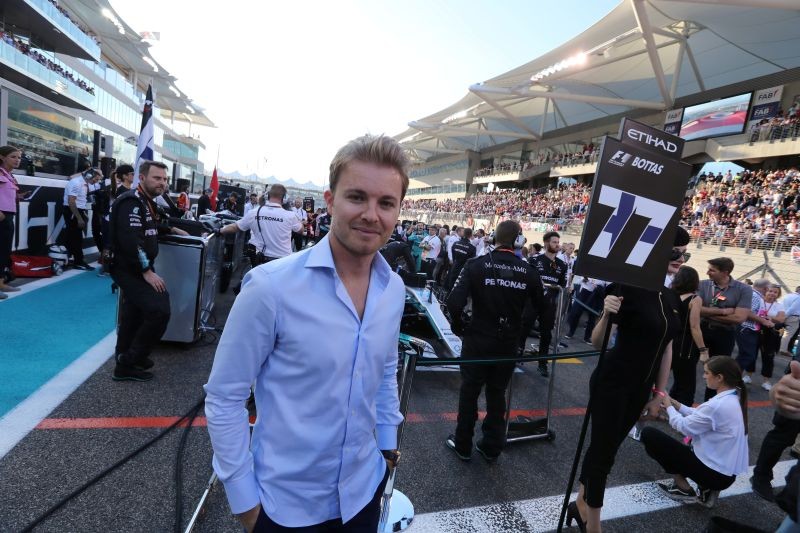 FIA Formula One World Champion Mercedes' driver Nico Rosberg posses for photographs at starting grid of Abu Dhabi Grand Prix. REUTERS/Hamad I Mohammed/Files