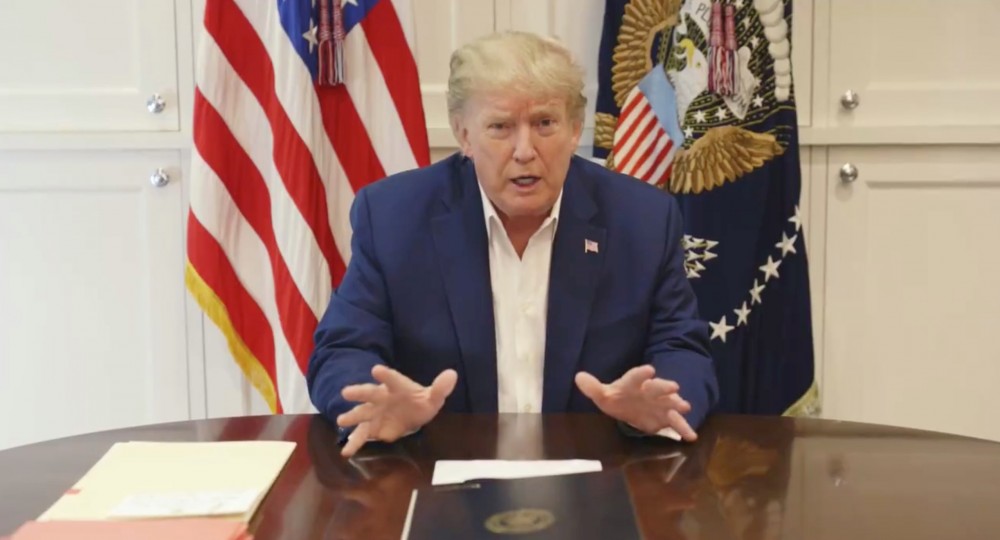 US President Donald Trump, who is being treated for COVID-19 in a military hospital outside Washington, speaks from his hospital room, in this still image taken from a video supplied by the White House on October 3.  (Photo: The White House/Handout via REUTERS)